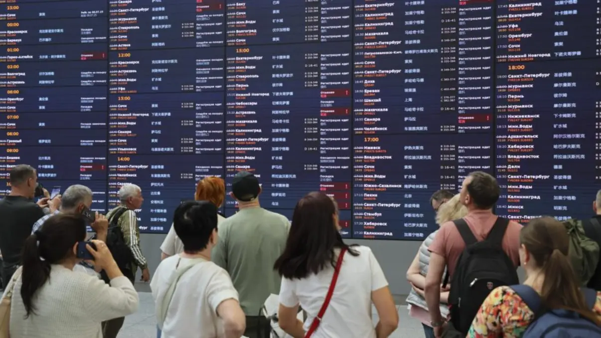 Russo announces closure of Moscow's main airports due to Ukrainian drone attacks, sparking concern among passengers and staff, and raising concerns about regional stability.