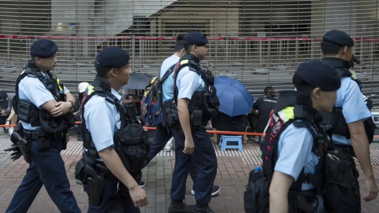 Hong Kong police issue arrest warrants for 19 overseas activists accused of supporting the "Hong Kong Parliament," aiming to subvert state power. Rewards offered for their capture.