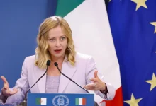 Time magazine features Italian Prime Minister Giorgia Meloni on its cover, calling her leadership style potentially world-changing. The article explores her rise to power, surprising critics with pragmatic policies and alliances despite her party's right-wing origins.